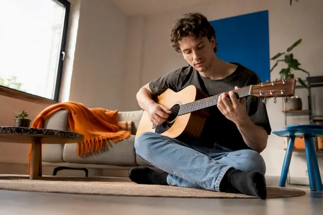 Hoe lang duurt het om gitaar te leren spelen?