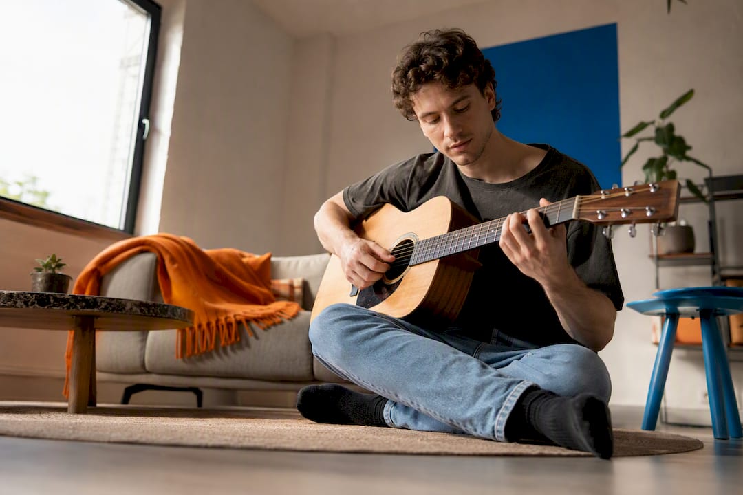Hoe lang duurt het om gitaar te leren spelen?